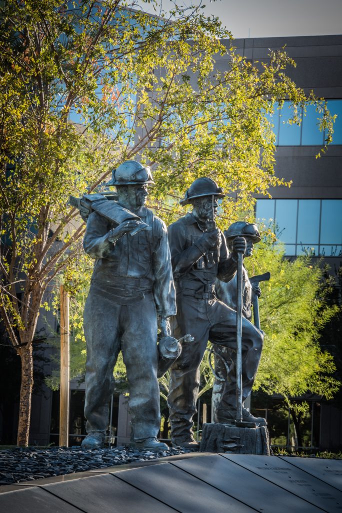 Bronze firefighters sculptures installed at the Phoenix, Arizona Fallen Firefighter Memorial by Paul Olesniewicz