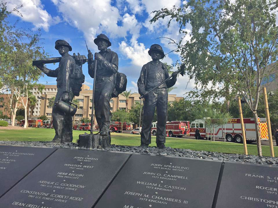 Bronze firefighters sculptures installed at the Phoenix, Arizona Fallen Firefighter Memorial by Paul Olesniewicz