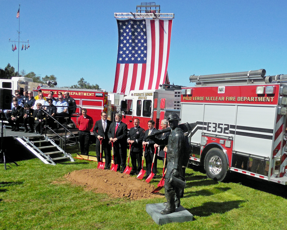 Bronze firefighters sculptures installed at the Phoenix, Arizona Fallen Firefighter Memorial by Paul Olesniewicz