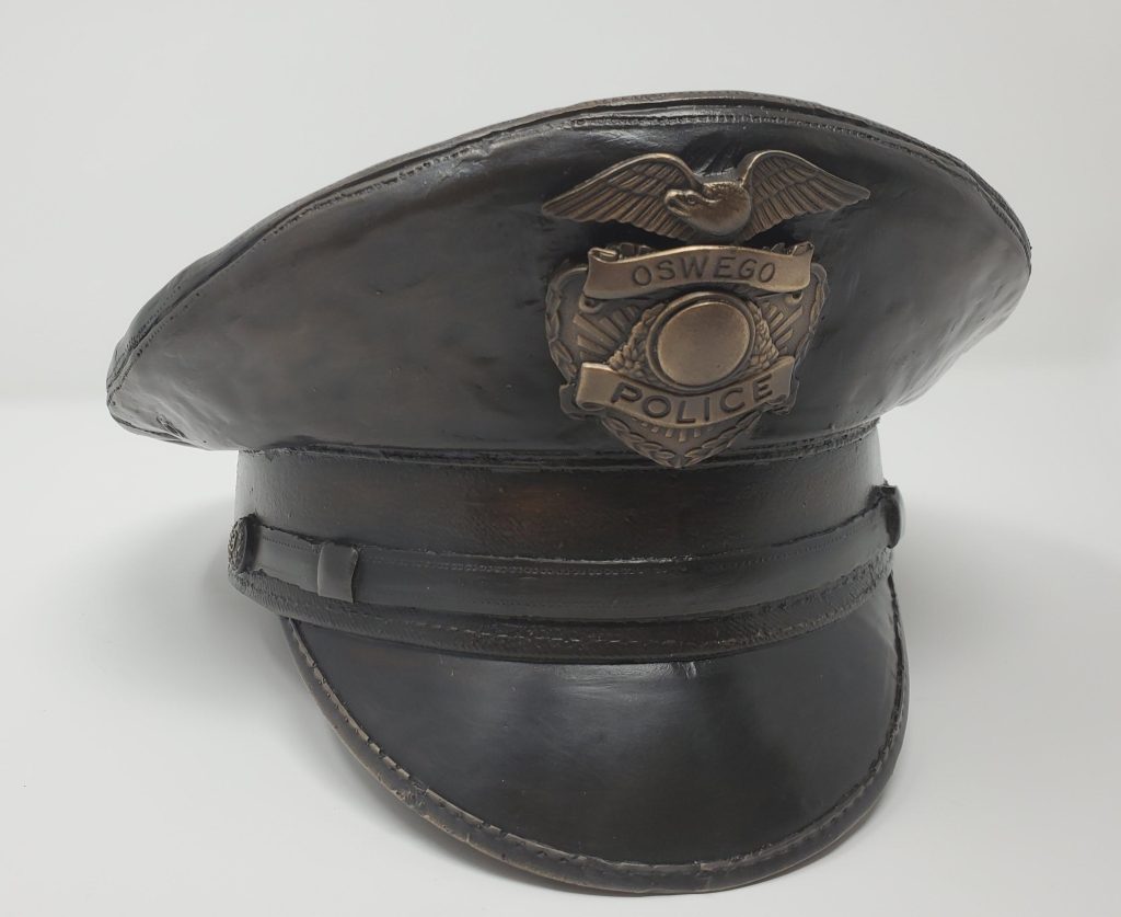 Bronze life size Police Officer Urn Modern Cap Sculpture in studio by Paul Olesniewicz